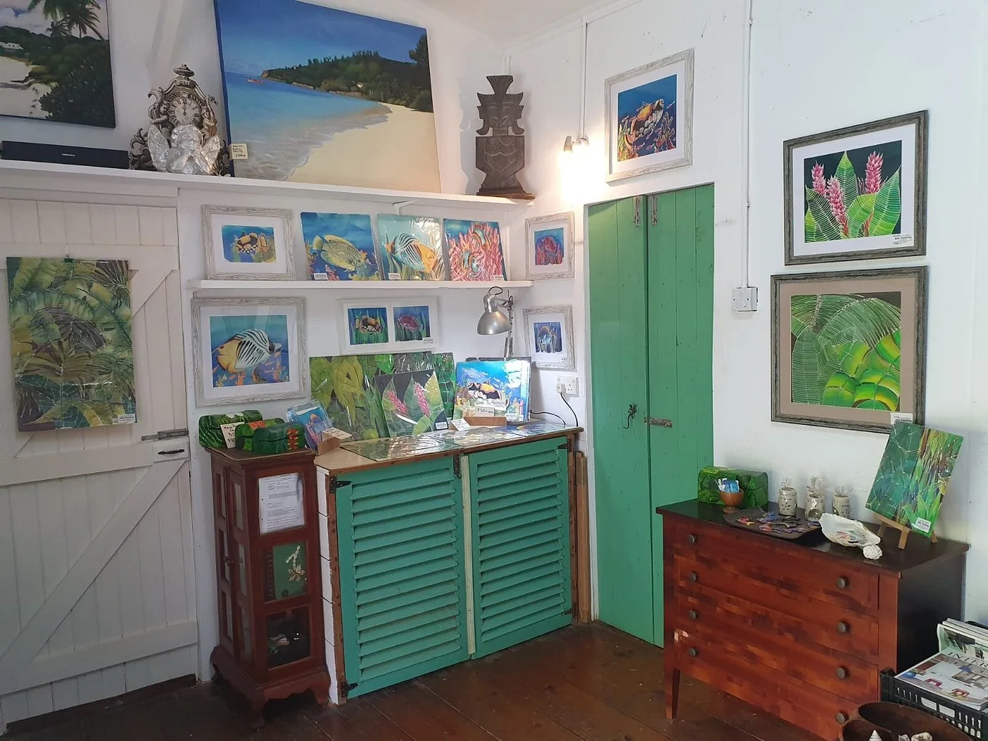 Andrew Gee art gallery interior with silk paintings and Seychelles watercolours — next to Maison Soleil at Maison Soleil, Anse Soleil, Seychelles