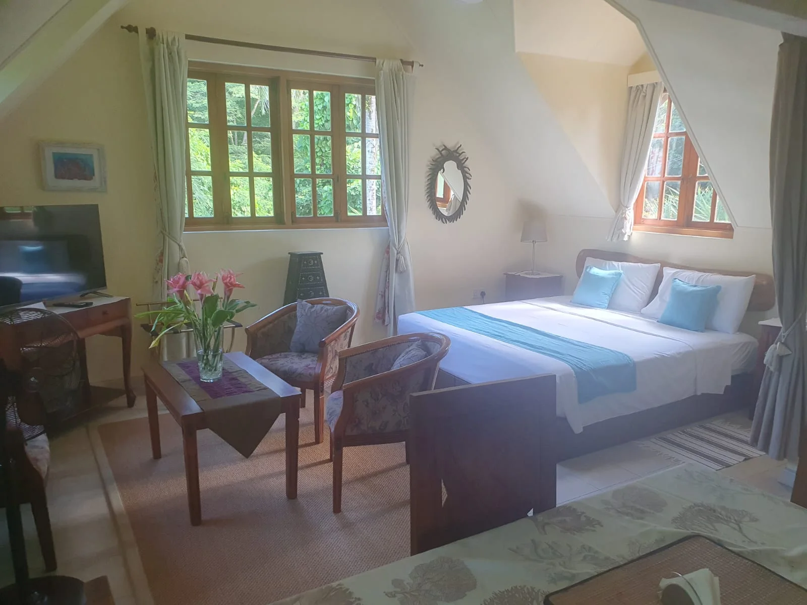 Vanilla Suite bathroom with granite counter, vessel sink and washing machine — guest utility area at Maison Soleil, Anse Soleil, Seychelles